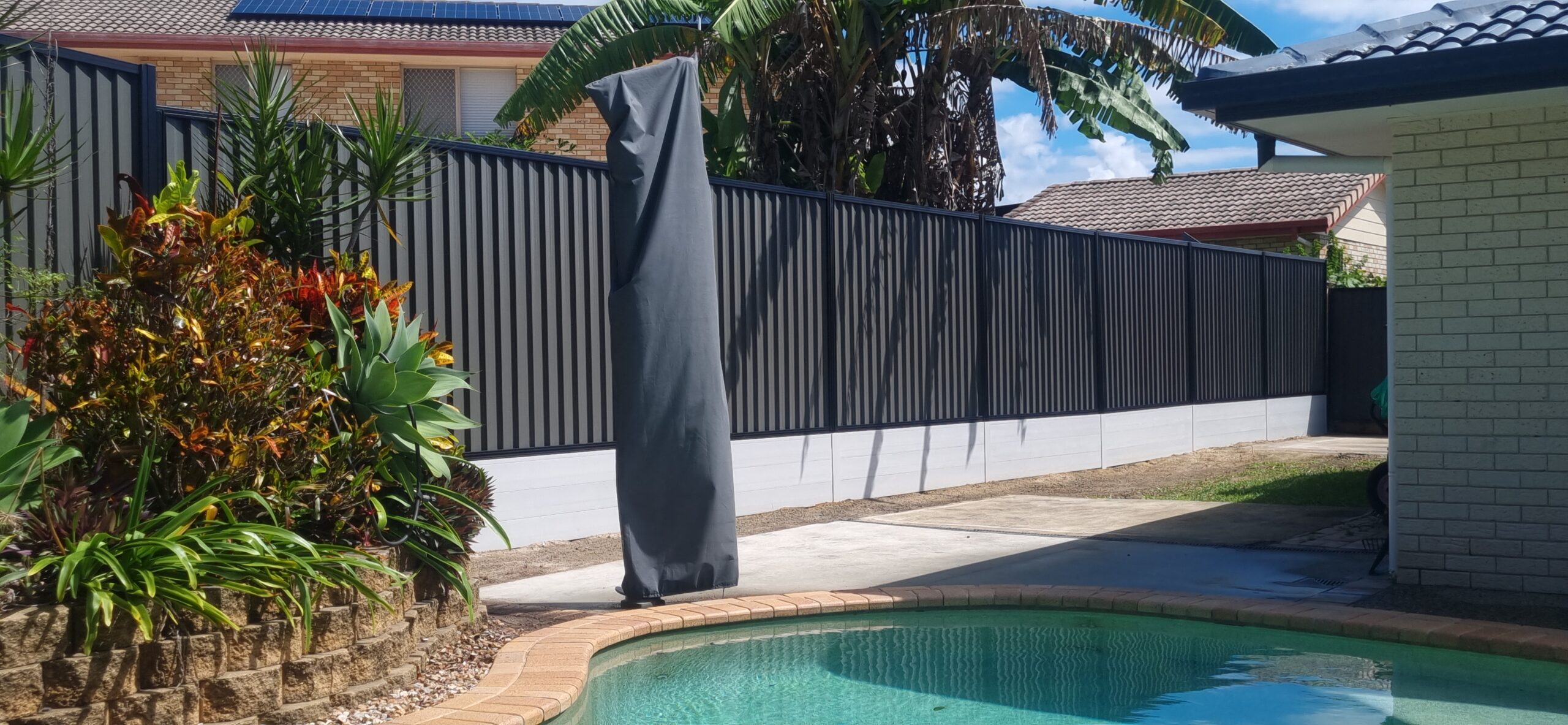 Concrete sleeper retaining wall construction in Capalaba