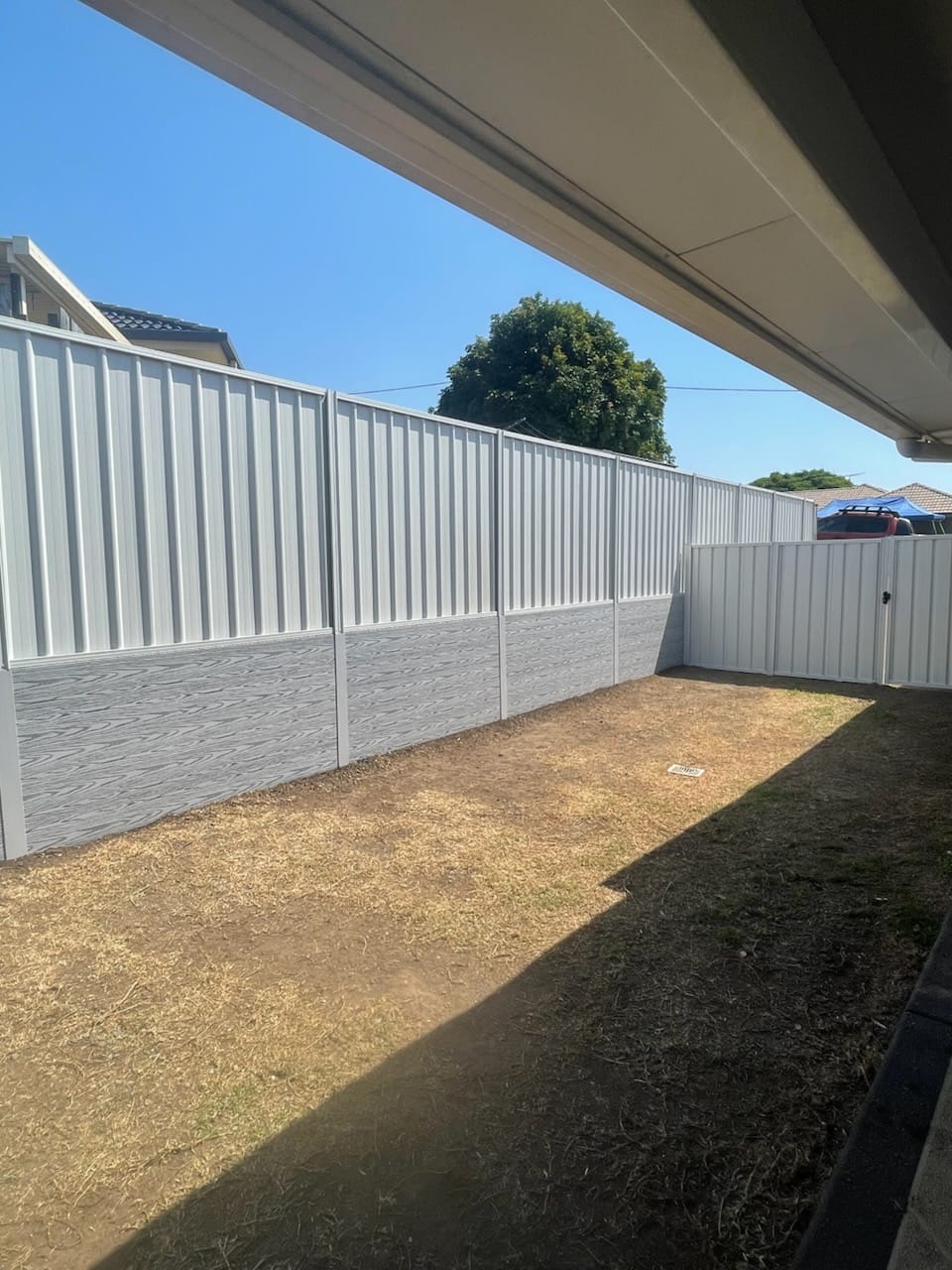 Garden landscaping and artificial turf installation in Capalaba backyard